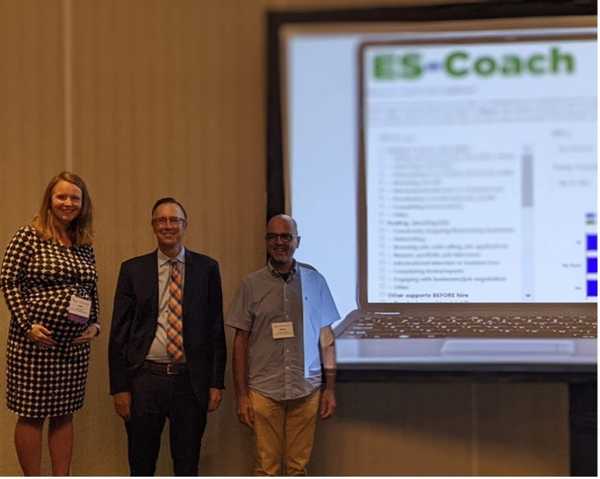 Brit Miles, Jeff Gentry, and Alberto Migliore presenting ES-Coach at the Reinventing Quality Conference