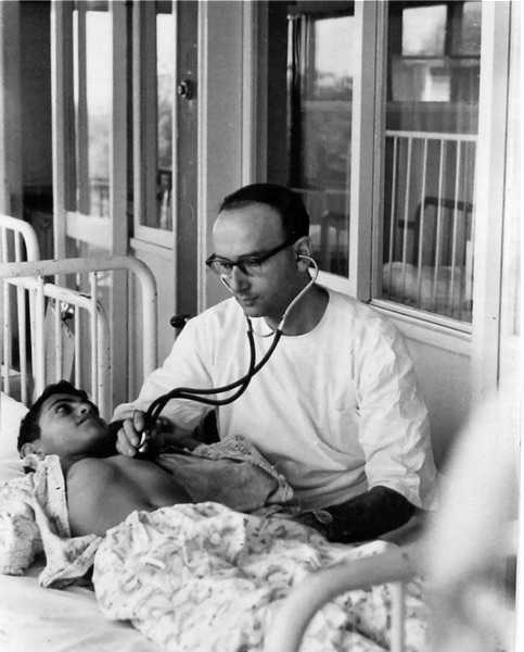 Dr. Szymanski with a patient